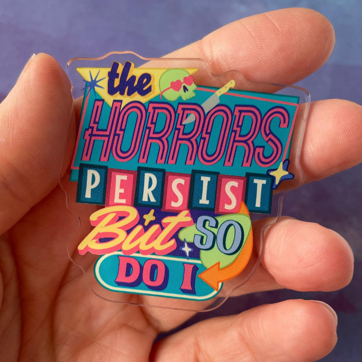 The Horrors Persist - Acrylic Swappable Badge Reel Design TOP