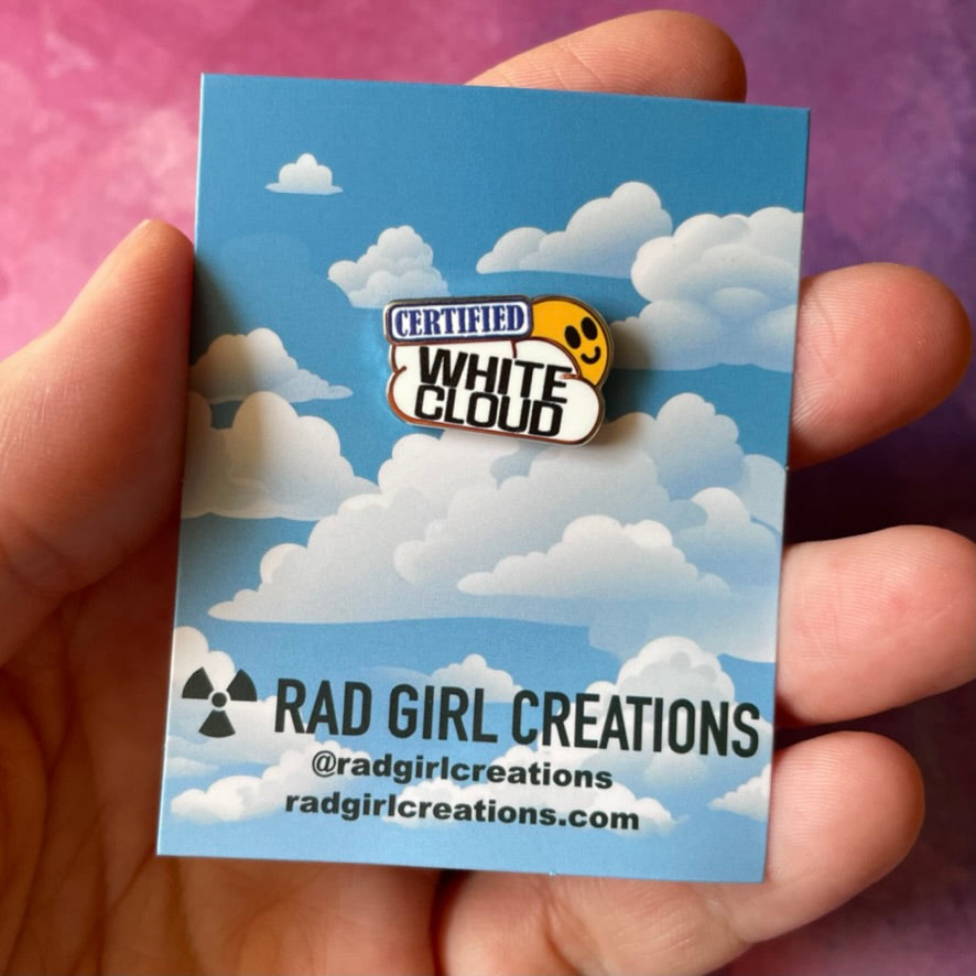 Pin with 'Certified White Cloud' text on a gray background