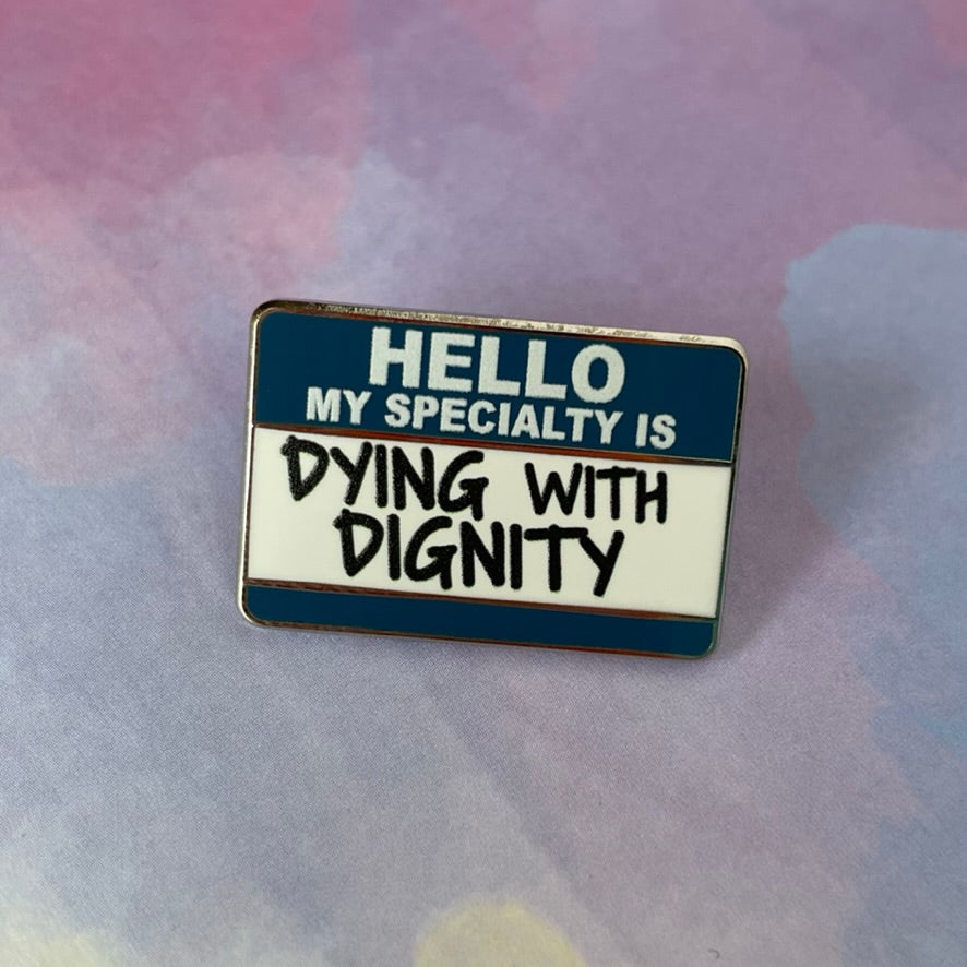 Pin with text 'HELLO MY SPECIALTY IS DYING WITH DIGNITY' on a gray background